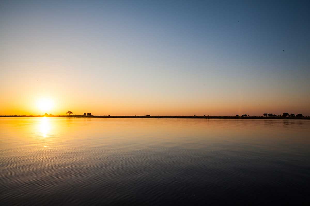 Camp Kuzuma, Hideaways, Kazuma Forest Reserve, Aktivitäten, Chobe River, Landschaft, Sonnenuntergang, Afrikarma, Afrikarma Safaris, Afrikarma Safaris - Wildnis. Hautnah., Afrikarma.de