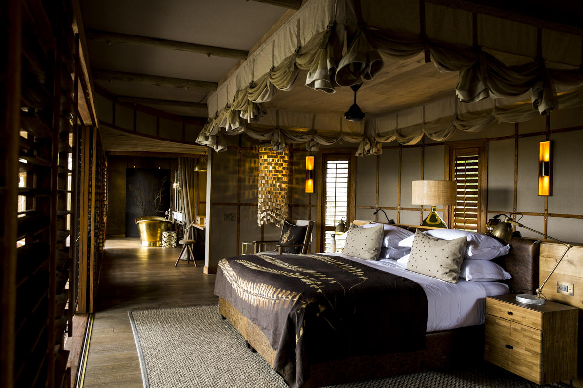 Little Mombo Camp: Suite Bett Little Mombo Camp: Suite Bett