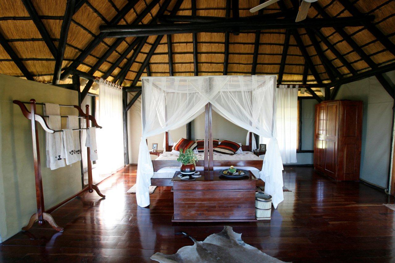 Camp Kwando: Gästechalet Camp Kwando, Caprivi, Cuando, Kwando, Caprivi Game Park, Doppelbett, Gästechalets, Mamili National Park, Moskitonetz, Mudumu National Park, afrikarma, afrikarma safaris, afrikarma.de