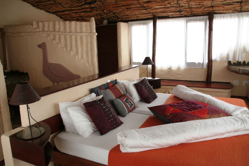 Ugab Terrace Lodge, Chalet, Doppelbett, Gästezimmer, Afrikarma, Afrikarma Safaris, Afrikarma Safaris - Wildnis. Hautnah., Afrikarma.de
