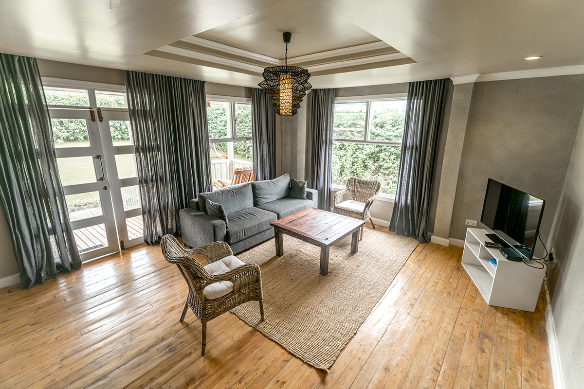 Five Volcanoes Boutique Hotel, Gorilla Tracking, Volcanoes National Park, Lounge, VIP Cottage, Afrikarma, Afrikarma Safaris, Afrikarma Safaris. Wildnis. Hautnah., Afrikarma.de