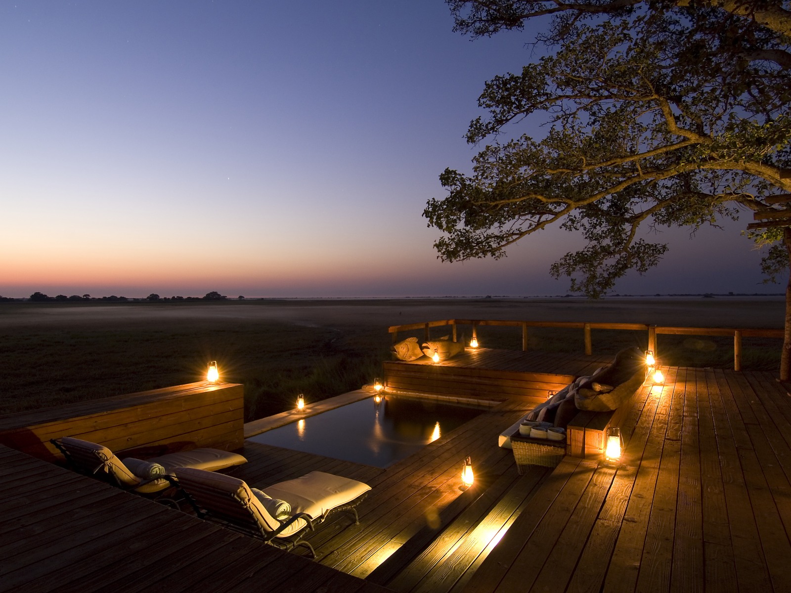 Busanga Plains, Kafue National Park, Schwemmebenen, Busanga-Ebenen, Fauna, Flood Plains, Heißluftballon, Kafue Nationalpark, Safari, Shumba Camp, Wilderness Safaris, Abend, Abendstimmung, Atmosphäre, Aussicht, Entspannen, Lounge, Plunge Pool, Pool, Romantik, Sonnenuntergang, Lichter, Lodge, Stimmung