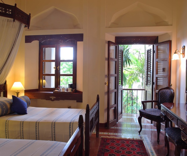 Afrika, Hotel, Luxusunterkunft, Sansibar, Serena, Strand, Tansania, Doppelbett, Gästezimmer, Afrikarma, Afrikarma Safaris, Afrikarma Safaris - Wildnis. Hautnah., afrikarma.de