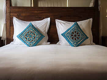 Machweo Wellness Retreat: Doppelbett in der Honeymoon-Suite