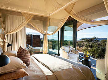 Tswalu Loapi Tented Camp: Schlafzimmer mit Blick in die Natur Tswalu Loapi Tented Camp: Schlafzimmer mit Blick in die Natur