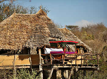 Loisaba Star Beds: Bett auf der Terrasse Loisaba Star Beds: Bett auf der Terrasse