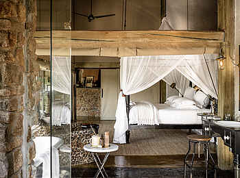 Singita Ebony Lodge: Schlafzimmer der Gästesuite Singita Ebony Lodge: Schlafzimmer der Gästesuite