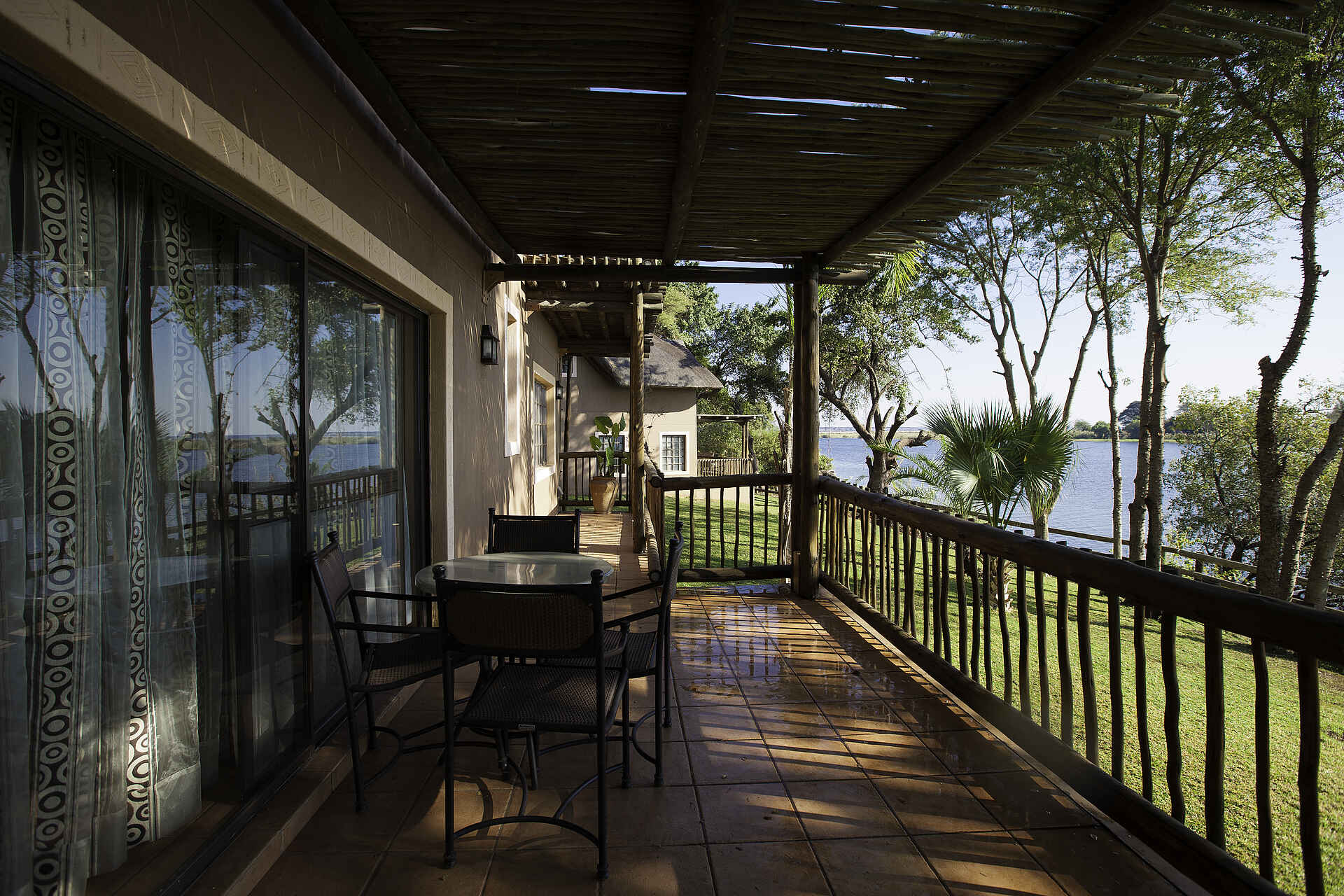 Chobe Marina Lodge: Private Veranda africa, african hotels & adventures, african hotels and adventures, afrika, afrikarma, aha group, botsuana, botswana, chobe, chobe marina, Chobe Marina Lodge, chobe national park, chobe nationalpark, chobe river, kasane, kasane airport, kasane marina lodge, konferenz, konferenzräume, nationalpark, nordbotswana, nordostbotswana, northeastern botsuana, northern botsuana, pirschfahrten, reise, reisen, safari, southern africa, südliches afrika, urlaub, balkon, gäste, gästeunterkunft, guest room, privat, veranda, zimmer