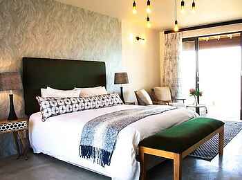 Simbavati Fynbos on Sea Lodge: Superior Suite Bett Simbavati Fynbos on Sea Lodge: Superior Suite Bett
