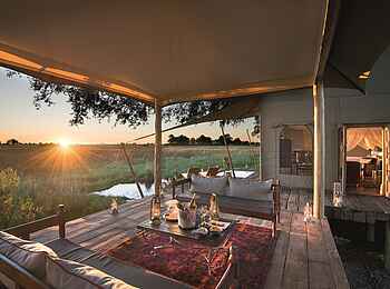 Duba Plains Camp: Sonnenuntergang am privaten Deck