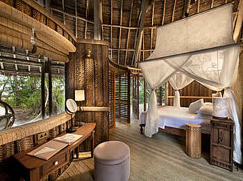 andBeyond Mnemba Island Lodge: Luxuriöses Schlafzimmer einer Banda