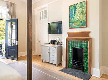 One Kensington Boutique Hotel: Ein Deluxe Zimmer mit Kamin