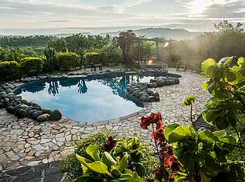 Volcanoes Kyambura Gorge Lodge: Swimming Pool Volcanoes Kyambura Gorge Lodge: Swimming Pool