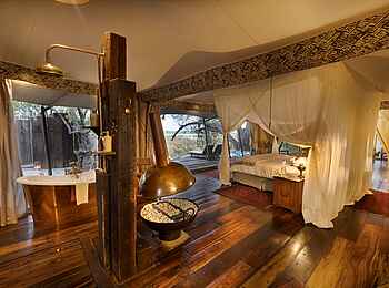 Zarafa Camp: Gästezelt mit offenem Badezimmer Zarafa Camp: Gästezelt mit offenem Badezimmer