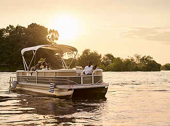 Victoria Falls River Lodge - Malachite Luxury Tented Suites: Bootstour bei Sonnenuntergang Victoria Falls River Lodge - Malachite Luxury Tented Suites: Bootstour bei Sonnenuntergang