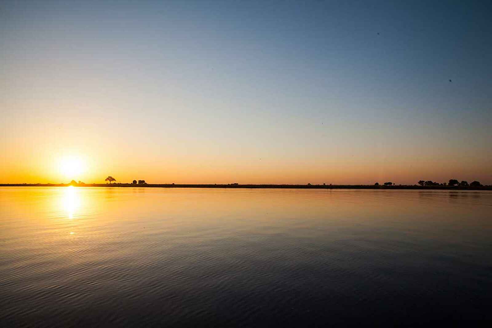 Camp Kuzuma: Sonnenuntergang über dem Chobe River Camp Kuzuma: Sonnenuntergang über dem Chobe River