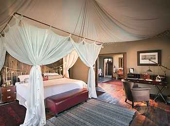 Duba Plains Camp: Doppelbett mit Moskitonetz