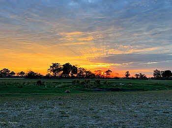 Luiana Plains Expedition Camp: Sonnenuntergang über den weiten Ebenen