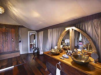 The Sambuk Suite at Mara Nyika Camp: Das Badezimmer The Sambuk Suite at Mara Nyika Camp: Das Badezimmer