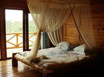 Cormoran Lodge: Schlafbereich mit Aussicht