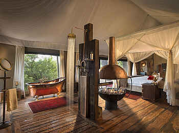 Zarafa Dhow Suites: Offenes Bad mit Kupferwanne