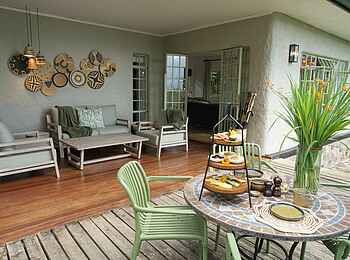 Wilderness Sabyinyo: Terrasse des Familien Cottage Wilderness Sabyinyo: Terrasse des Familien Cottage