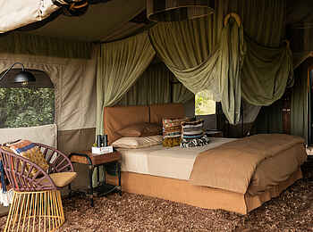 Singita Mara River Tented Camp: Das Bett Singita Mara River Tented Camp: Das Bett