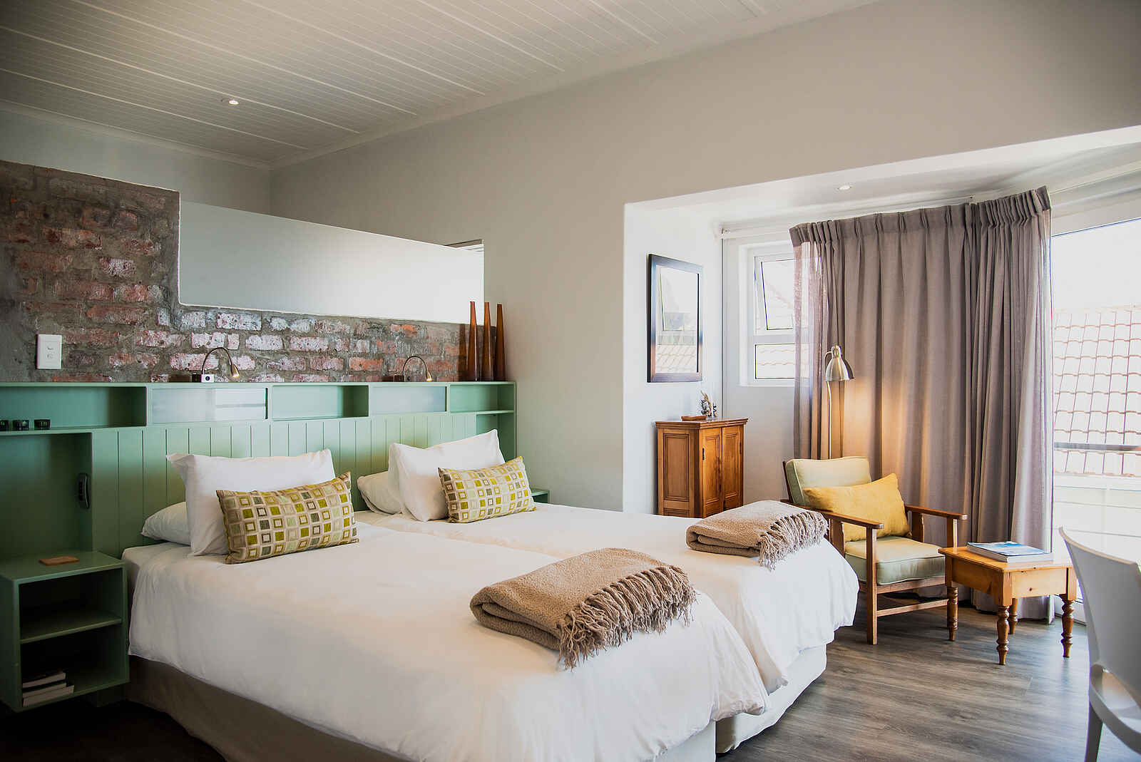 Whalesong Lodge: Zweibettzimmer mit Sitzecke Whalesong Lodge: Zweibettzimmer mit Sitzecke