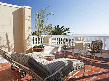 Ellerman House: Deluxe House Room - Balkon mit Liegestühlen Ellerman House: Deluxe House Room - Balkon mit Liegestühlen