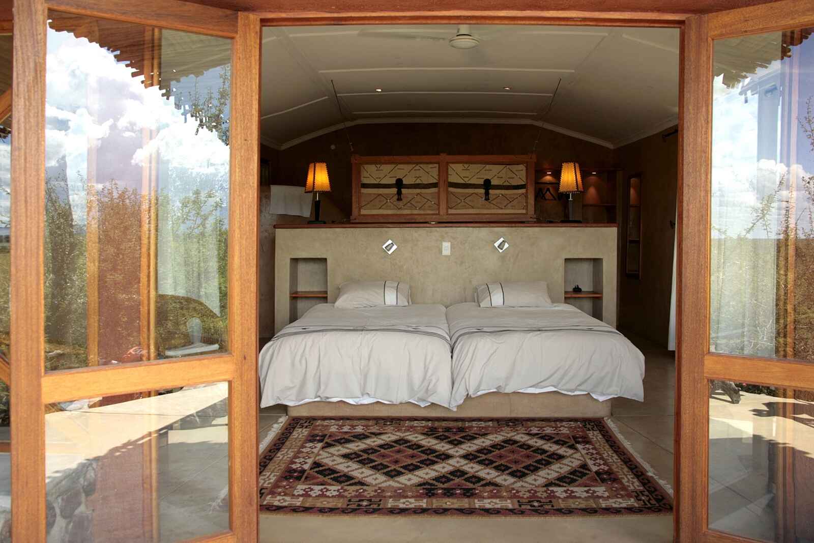 Waterberg Guest Farm: Blick ins Bungalow-Schlafzimmer Waterberg Guest Farm: Blick ins Bungalow-Schlafzimmer