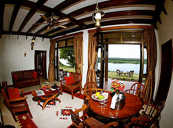 Paraa Safari Lodge: Queen's Cottage Wohnzimmer Paraa Safari Lodge: Queen's Cottage Wohnzimmer