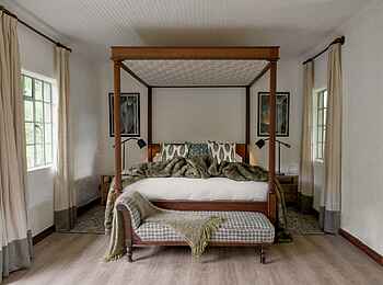 Wilderness Sabyinyo: Schlafzimmer einer Suite Wilderness Sabyinyo: Schlafzimmer einer Suite