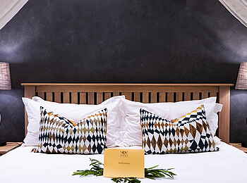 Inyati Game Lodge: Doppelbett im Familienchalet