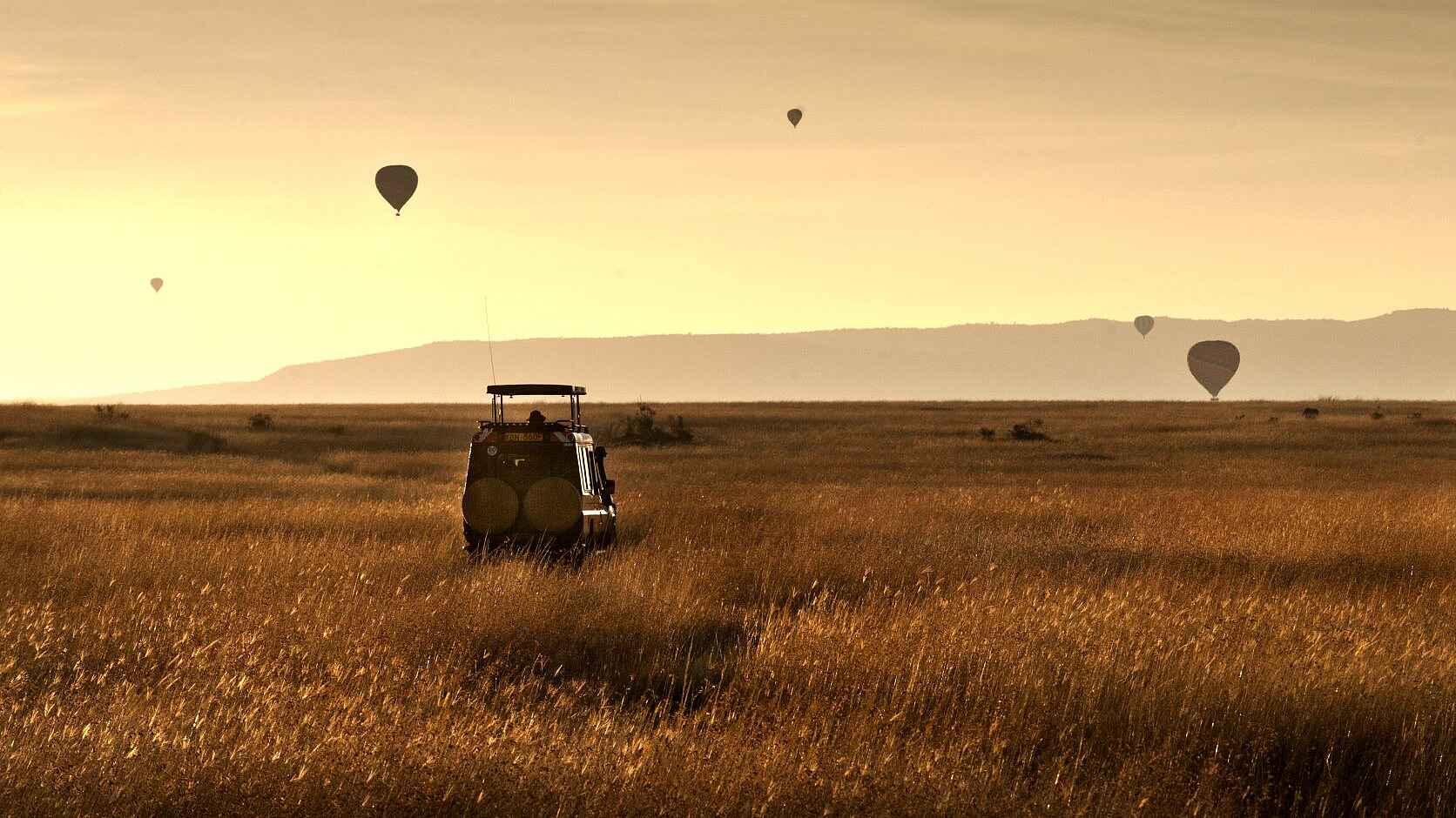 Soroi Mara Bush Camp: Pirschfahrt mit Ballons am Himmel