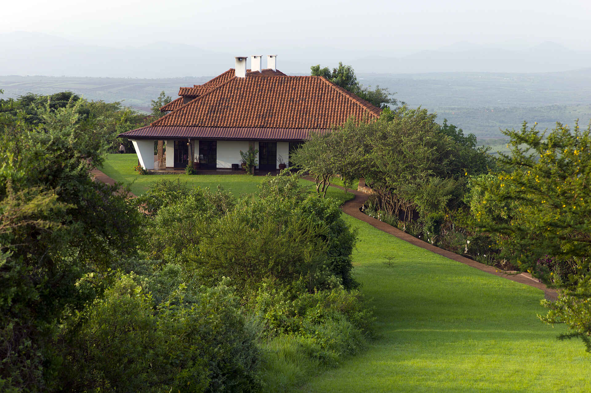 Bashay Rift Lodge, Karatu, Ngorongoro Conservation Area, Tanganyika Expeditions, Cottage, Garten, Afrikarma, Afrikarma Safaris, Afrikarma Safaris - Wildnis. Hautnah., Afrikarma.de