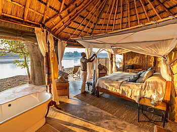 Time + Tide Mchenja: Schlafzimmer mit Bad