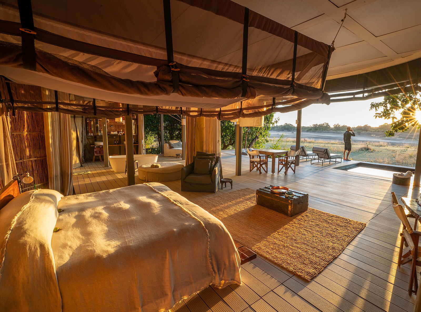 Time + Tide Chinzombo: Villa im Sonnenuntergang Time + Tide Chinzombo: Villa im Sonnenuntergang