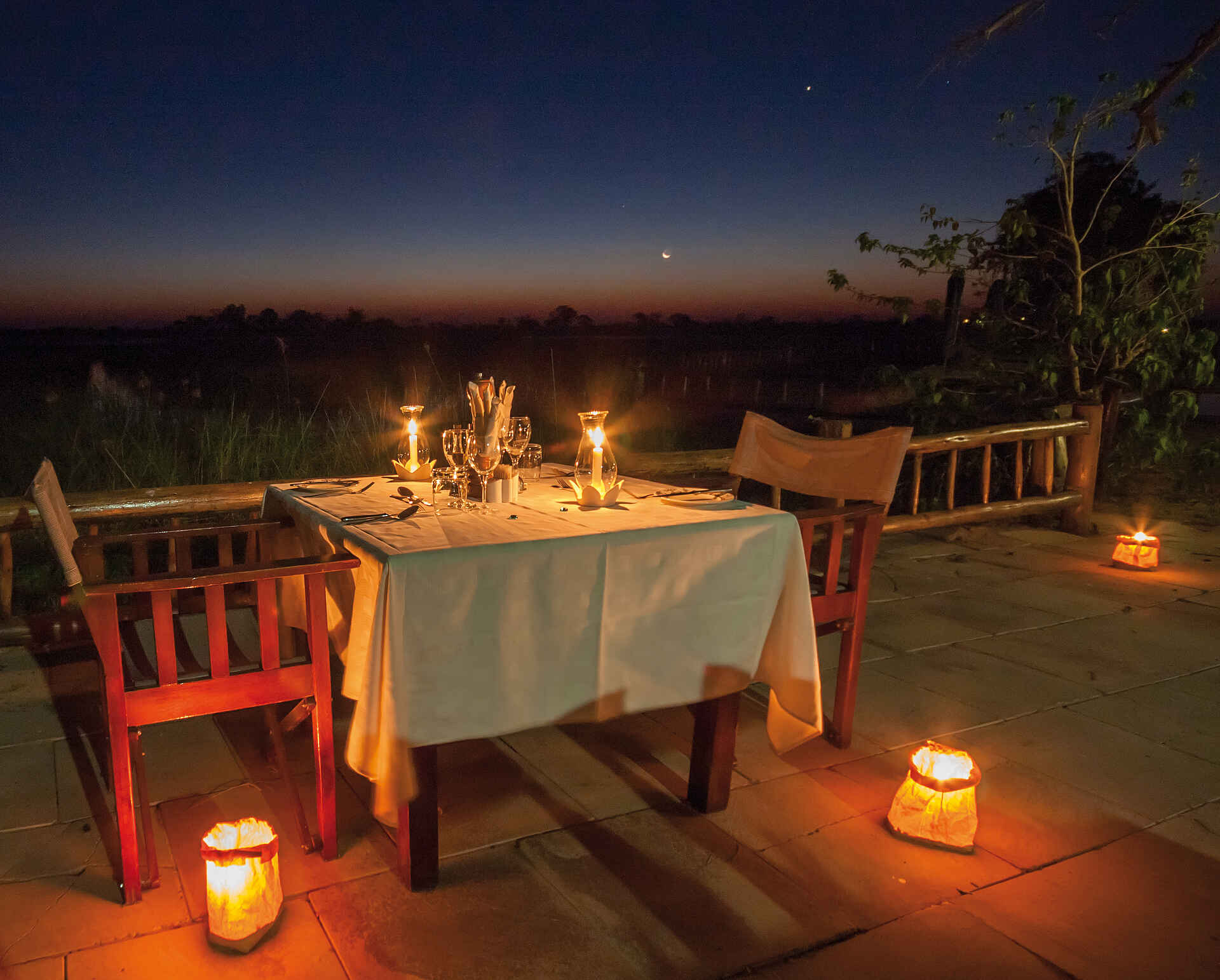 africa, afrika, auszeichnung, award, belmond, belmond eagle island camp, Belmond eagle island lodge, bilder, boro channel, boro-kanal, botsuana, botswana, buchen, buchung, eagle island camp, eagle island lodge, fish eagle bar, helikopter, helikoptersafari, hubschrauber, info, information, informieren, nordbotswana, northern botsuana, okavango, okavango delta, okavango-delta, orient epress safaris, orient express, orient-express, reise, reisen, reiseveranstalter, safari, southern africa, sÃ¼dliches afrika, urlaub, vollpension, wasseraktivitÃ¤ten, xaxaba, xaxaba island, xaxaba village, abend, abendessen, aktivitÃ¤ten, dinner, essen, lichter, romantik, stimmung, tafel, tisch, aktivitäten, südliches afrika, wasseraktivitäten