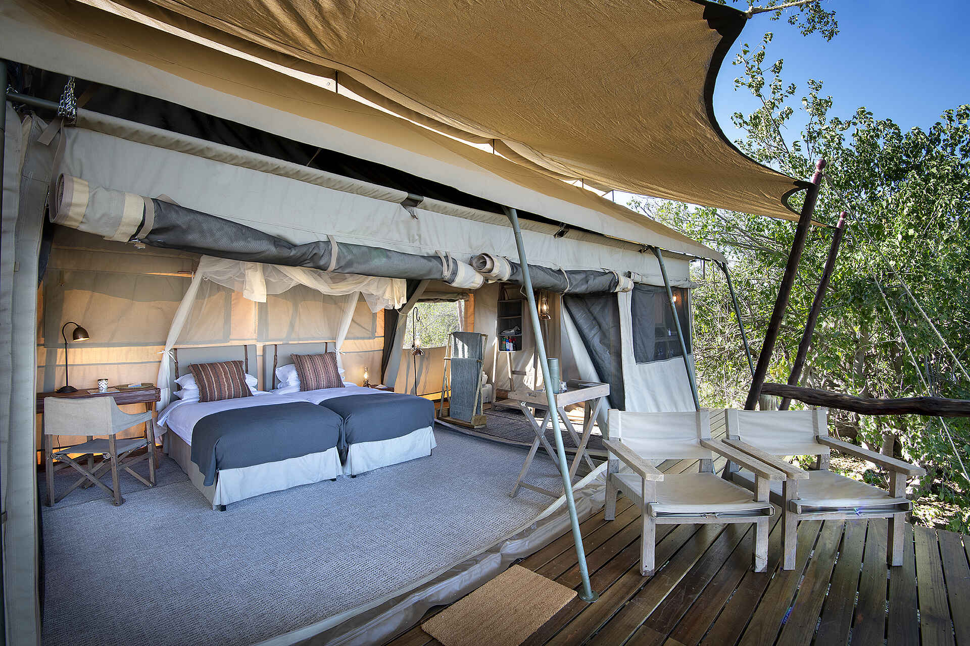 African Bush Camps, Chobe Enclave, Glambing, Linyanti Expeditions, Linyanti Sümpfe, Gästezelt, Liegestuhl, Afrikarma, Afrikarma Safaris, Afrikarma Safaris. Wildnis. Hautnah., Afrikarma.de