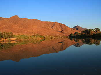Okahirongo River Camp: Absolute Symmetrie Okahirongo River Camp: Absolute Symmetrie
