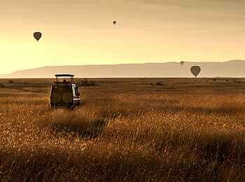 Soroi Mara Bush Camp: Pirschfahrt mit Ballons am Himmel