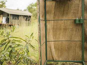 Karenge Bush Camp: Bucket Shower Karenge Bush Camp: Bucket Shower