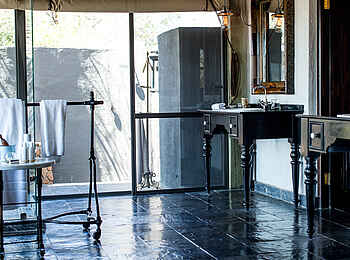 Singita Ebony Lodge: Badezimmer der Familiensuite Singita Ebony Lodge: Badezimmer der Familiensuite