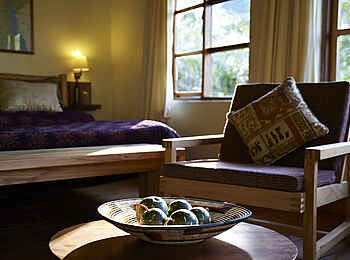 Volcanoes Bwindi Lodge: Sitzbereich im Schlafzimmer