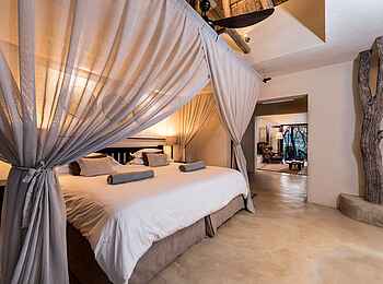Sabi Sabi Bush Lodge: Schlafzimmer der Standard Suite Sabi Sabi Bush Lodge: Schlafzimmer der Standard Suite