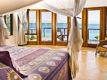 Pumulani Lodge: Doppelbett mit Moskitonetz