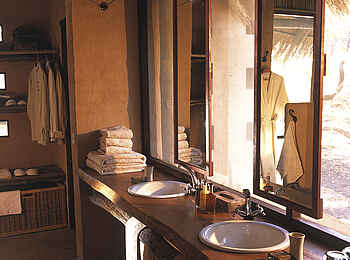 Sandibe Okavango Safari Lodge: Badezimmer Sandibe Okavango Safari Lodge: Badezimmer