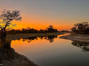 Luiana Plains Expedition Camp: Flußlandschaft bei Sonnenuntergang