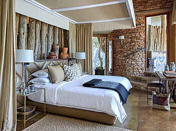 Singita Pamushana Lodge: Doppelbett mit 7 Kissen