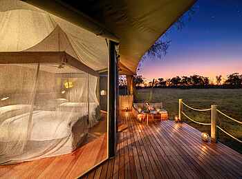 Khwai Lediba: Bett und Terrasse Khwai Lediba: Bett und Terrasse